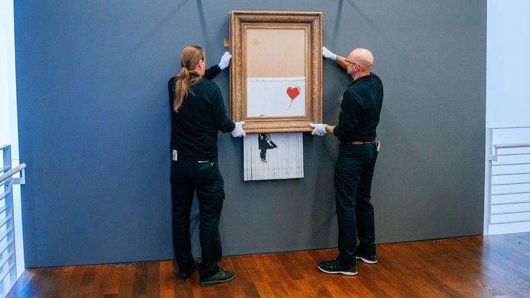 "Love Is In The Bin" De Banksy : L'oeuvre Autodétruite Exposée En Allemagne