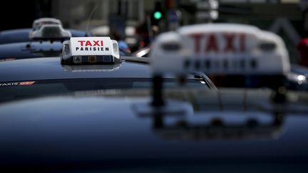 Des taxis parisiens lors d'une manifestation dans la capitale, le 16 juin 2015. (MAXPPP)