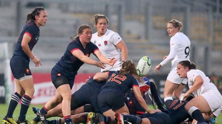 La France et l'Angleterre se livre un sacré combat en demi-finales de la Coupe du Monde. (PAUL FAITH / AFP)