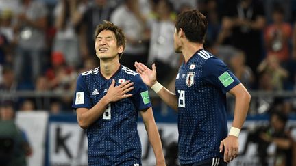 Le japonais Genki Haraguchi célèbre l'ouverture du score lors du 8e de finale contre la Belgique, le 2 juillet 2018, à&nbsp;Rostov, en Russie. (FILIPPO MONTEFORTE / AFP)