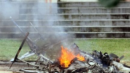 Un hélicoptère de la police a été abattu par les trafiquants de drogue à Rio de Janeiro (17/10/2009) (© AFP / Helio Cardoso)