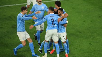 Manchester City célèbre contre Dortmund  (WOLFGANG RATTAY / AFP)