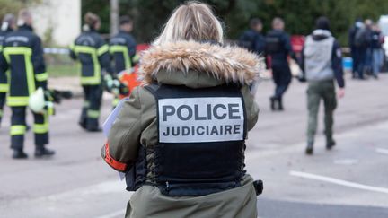 Une membre de la police judiciaire. Image d'illustration. (JC TARDIVON/MAXPPP)