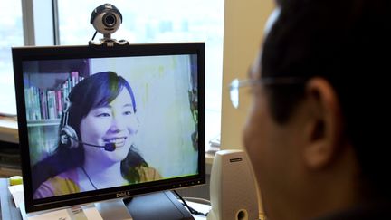 Un entretien par webcam. (RICHARD A. BROOKS / AFP)