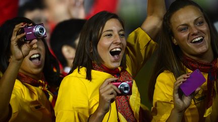 Code couleur jaune pour les athl&egrave;tes espagnoles, et mauve pour leurs appareils photos. (ADRIAN DENNIS / AFP)