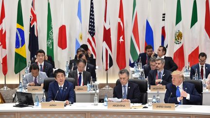 Une partie des dirigeants réunis pour le G20 d'Osaka (Japon), le 29 juin. (KAZUHIRO NOGI / POOL / AFP POOL)