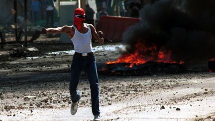 &nbsp; (Un manifestant palestinien lors de la seconde Intidada le 6 octobre 2000©MAXPPP)