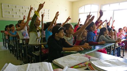 Dans le nord du Liban, &agrave; Qubbet Beshamra, une classe pour enfants syriens a &eacute;t&eacute; ouverte le 13 octobre 2012. (AFP)