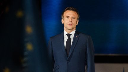 Emmanuel Macron après sa réélection à la présidence de la République, le 24 avril 2022 au Champ-de-Mars, à Paris. (ANNA MARGUERITAT / HANS LUCAS / AFP)