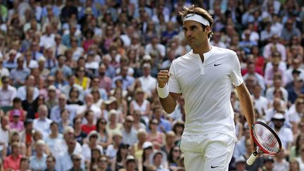 Roger Federer retrouvera Novak Djokovic en finale comme en 2014 (ADRIAN DENNIS / AFP)