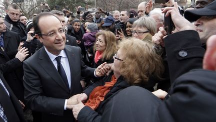 Le pr&eacute;sident Fran&ccedil;ois Hollande, le 21 mars 2013 &agrave; Alfortville. (JACKY NAEGELEN / POOL)