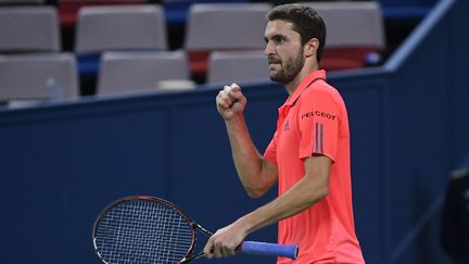 Satisfaction pour Gilles Simon (WANG ZHAO / AFP)