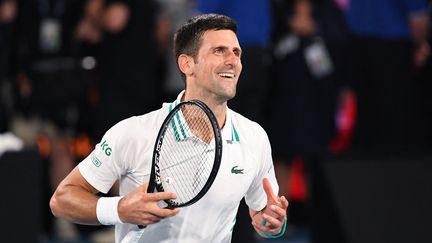 Novak Djokovic après sa victoire à l'Open d'Australie, à Melbourne, dimanche 21 février 2021. (WILLIAM WEST / AFP)