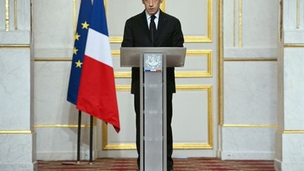 Le président Nicolas Sarkozy annonce que les avions français sont déjà en Libye, à l'issue d'un sommet à Paris (AFP - Lionel BONAVENTURE)