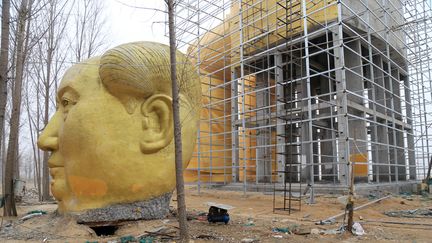 La statue de Mao Zedong a été réalisée à partir de béton et d'acier. (IMAGINECHINA / AFP)