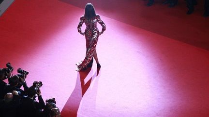 Les flashs crépitent sur les marches mythiques du Festival de cannes
 (ERIC GAILLARD/AFP)