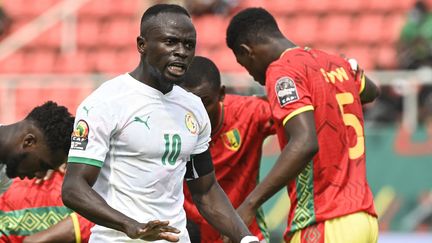 Les Sénégalais ont concédé le match nul face à une solide équipe de Guinée. (PIUS UTOMI EKPEI / AFP)