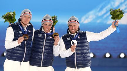 Le tripl&eacute; de Jean-Fr&eacute;d&eacute;ric Chapuis (G), Arnaud Bovolenta (C) et Jonathan Midol,&nbsp;en skicross, le 20 f&eacute;vrier 2014, aux JO de Sotchi. (ANTONIN THUILLIER / AFP)