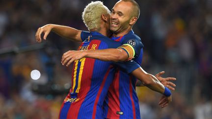 Neymar et Andres Iniesta (LLUIS GENE / AFP)