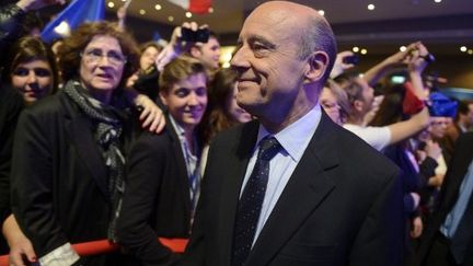 Alain Juppé arrive à La Mutualité (Paris), le 22 avril 2012. (AFP - Lionel Bonaventure)