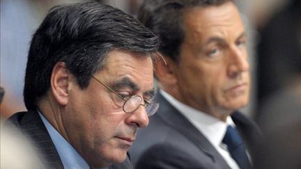 François Fillon et Nicolas Sarkozy à Sablé-sur-Sarthe (Sarthe) le 28 juin 2011 (AFP - PHILIPPE WOJAZER)