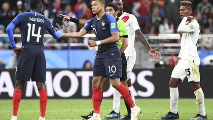 Matuidi et Mbappé (ANNE-CHRISTINE POUJOULAT / AFP)