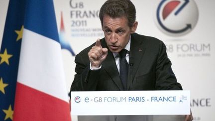 Nicolas Sarkozy s'adresse aux acteurs de l'internet et des nouvelles technologies réunis à Paris pour le sommet du G8 (LIONEL BONAVENTURE / POOL / AFP)