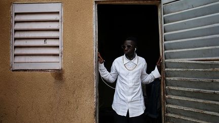 ramasse lui aussi les ordures à l'aide d'un âne. Il déclare: «J'aime ce métier car cela me permet d'acheter des vêtements et de mettre de l'argent de côté.»
 (Luc Gnago / Reuters)