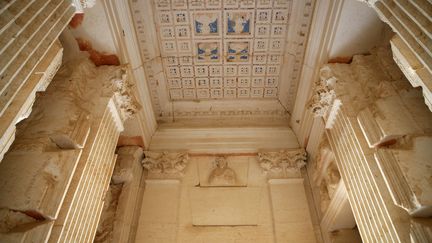 Funerary tower-tomb interior with loculi shelves for bodies, family portraits on ceiling tiles and bust statue, Valley of Tombs, late 3rd century, AD, Palmyra, Syria Picture by Manuel Cohen (MANUEL COHEN / AFP )