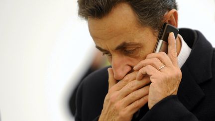 &nbsp; (Nicolas Sarkozy en garde à vue, après des écoutes téléphoniques © MaxPPP)