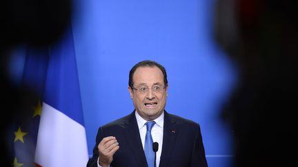 Le pr&eacute;sident Fran&ccedil;ois Hollande, lors d'une conf&eacute;rence de presse &agrave; Bruxelles (Belgique), le 20 d&eacute;cembre.&nbsp; (LIONEL BONAVENTURE / AFP)