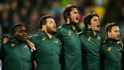 Les joueurs sud-africains chantent leur hymne national lors du match contre les All Blacks, le 13 septembre 2014, &agrave; Wellington (Nouvelle-Z&eacute;lande). (HAGEN HOPKINS / GETTY IMAGES ASIAPAC)