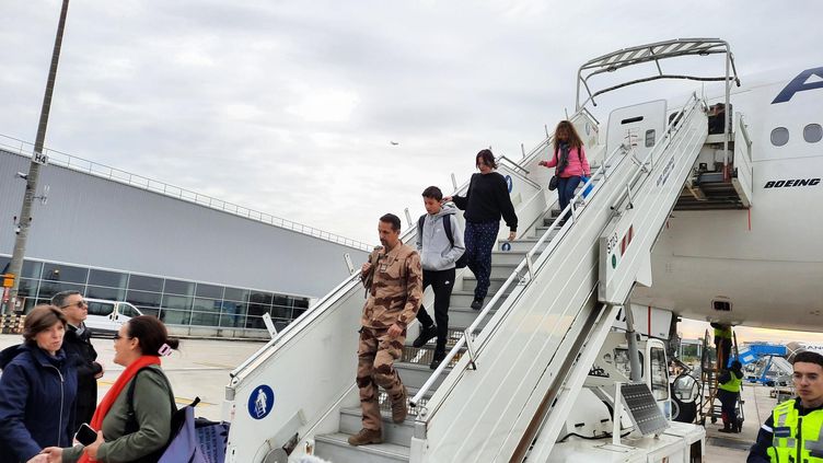 The 245 nationals evacuated from Sudan arrived at Roissy Charles de Gaulle airport on April 26, 2023. (ALAIN GASTAL / FRANCEINFO)