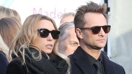 Laura Smet et David Hallyday, le 9 décembre 2017 aux obsèques de leur père à Paris. (LUDOVIC MARIN / AFP)