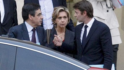 Le Premier ministre, Fran&ccedil;ois Fillon, la ministre du Budget, Val&eacute;rie P&eacute;cresse, et le ministre de l'Economie, Fran&ccedil;ois Baroin, sortent du palais de l'Elys&eacute;e, le 5 novembre 2011. (BISSON / JDD / SIPA)