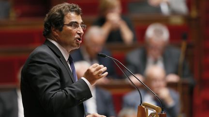 Christian Jacob, le pr&eacute;sident du groupe UMP &agrave; l'Assembl&eacute;e &agrave; Paris, le 4 septembre 2013 &agrave; la tribune face aux d&eacute;put&eacute;s. (PATRICK KOVARIK / AFP)