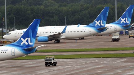 Des avions de la compagnie aérienne XL Airways, le 12 septembre 2008 à l'aéroport de Manchester (Royaume-Uni).&nbsp; (PAUL ELLIS / AFP)