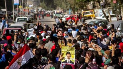 Le 12 décembre 2014 au Caire des partisans de Morsi défilaient pour dénoncer le coup d'état militaire. (STRINGER / ANADOLU AGENCY)