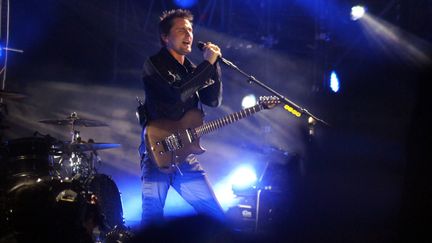 Matthew Bellamy du groupe Muse en concert à Aix-les-Bains en juillet 2015
 (CITIZENSIDE / NICOLAS LHOTEL / AFP)