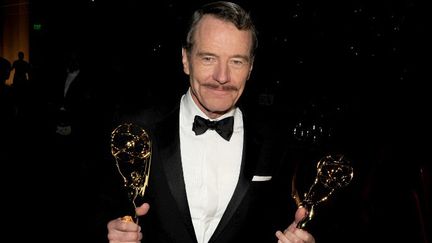 La vedette de la série "Breaking Bad" avec l'Emy Award de la meilleure série dramatique et du meilleur acteur, aux Emmy Awards à Los Angeles, le 25 août 2014
 (KEVIN WINTER / GETTY IMAGES NORTH AMERICA / AFP)