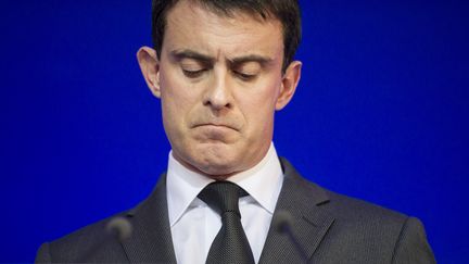 Manuel Valls, le ministre de l'Int&eacute;rieur, lors d'une conf&eacute;rence de presse, &agrave; Paris, le 31 janvier 2014. (FRED DUFOUR / AFP)