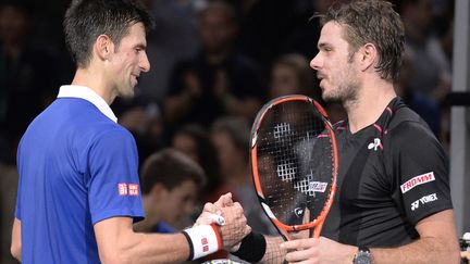 Novak Djokovic face à Stan Wawrinka, un classique du circuit (MIGUEL MEDINA / AFP)