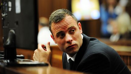 L'athl&egrave;te sud-africain Oscar Pistorius au 13e jour de son proc&egrave;s &agrave; Pretoria, le 19 mars 2013. (LEON SADIKI / AFP)