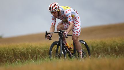 Jonas Abrahamsen, the wearer of the polka dot jersey, during the 8th stage of the Tour de France 2024 between Semur-en-Auxois and Colombey-les-deux-Eglises, on July 6, 2024 (ANNE-CHRISTINE POUJOULAT / AFP)