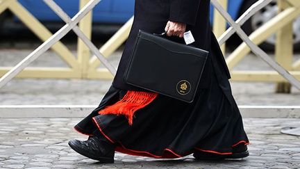 A à la fin d'une réunion de pré-conclave, le 7 mars 2013, au Vatican.  (AFP PHOTO / VINCENZO PINTO)