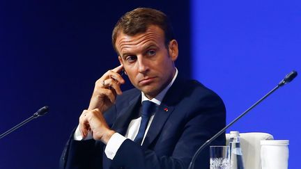 Emmanuel Macron participe à un forum économique à Saint-Pétersbourg (Russie), le 25 mai 2018. (SEFA KARACAN / ANADOLU AGENCY / AFP)