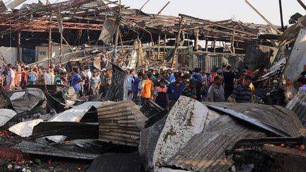 &nbsp; (Le marché de Sadr City après l'attentat © KARIM KADIM | AP| Sipa)