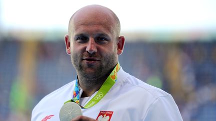 L'athlète&nbsp;Piotr Malachowski à Rio (Brésil) où il a gagné une médaille d'argent au lancer de disque, le 13 août 2016. (MICHAEL KAPPELER / DPA / AFP)