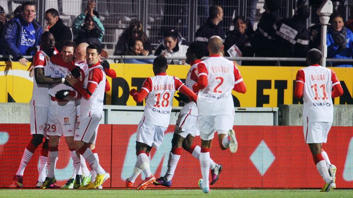 La joie des joueurs de Nancy face &agrave; Troyes, le 6 avril 2013.&nbsp; (JEAN-CHRISTOPHE VERHAEGEN / AFP)