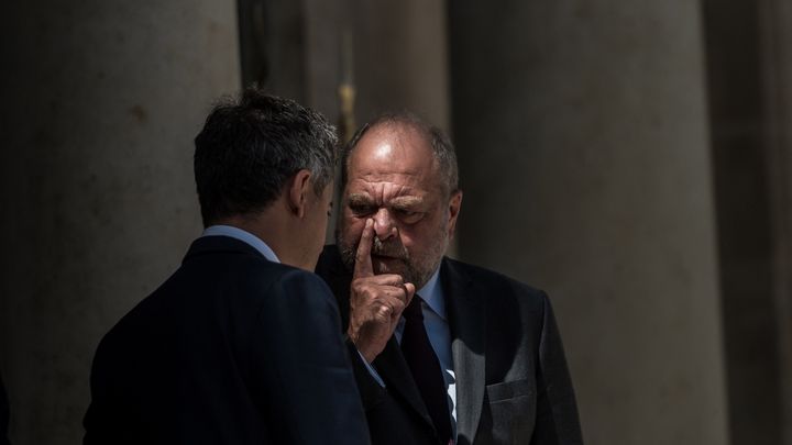 Gérald Darmanin et Eric Dupond-Moretti, le 13 juillet 2022, à l'Elysée. (ARTHUR NICHOLAS ORCHARD / AFP)